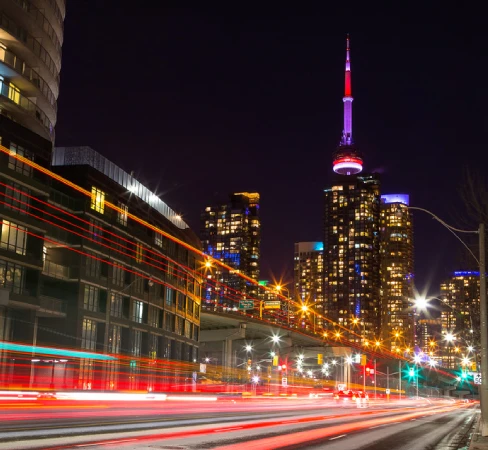 Rapidly moving traffic in the City of Toronto.